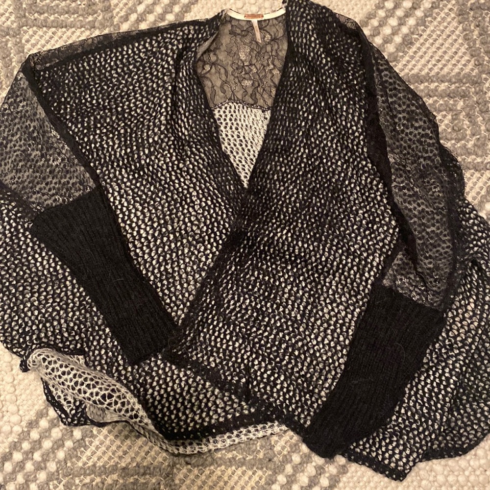 Black cardigan.  Worn once.  Lace detail along the back.